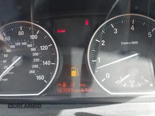 2011 BMW 1 Series 128i with VIN WBAUL7C5XBVE87044, listed as a IAAI auction lot 42095602 with 163,049 mi miles and . Bid and sale history available at carsss.com. Image 7.