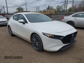 2021 Mazda 3 Select z VIN JM1BPBKL5M1339375, wystawiony jako IAAI lot #42124690 z przebiegiem 43 793 mil mil oraz . Historia ofert i sprzedaży dostępna na DreamBid. Obrazek 1.