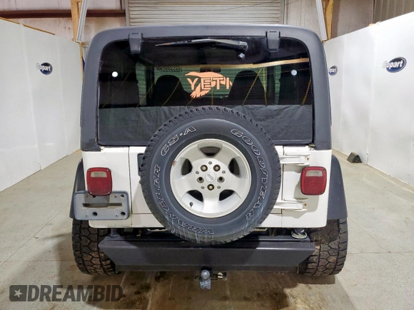 2001 Jeep Wrangler Sahara with VIN 1J4FA59S41P303519, listed as a Copart auction lot 59899545 with 238,151 mi miles and Clean title. Bid and sale history available at DreamBid. Image 6.