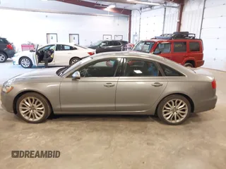 2014 Audi A6 Premium Plus with VIN WAUGFAFCXEN085327, listed as a IAAI auction lot 42094205 with 97,389 mi miles and . Bid and sale history available at DreamBid. Image 14.