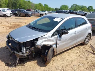 2016 Kia Rio LX with VIN KNADM5A31G6651718, listed as a IAAI auction lot 42056210 with 228,381 mi miles and . Bid and sale history available at DreamBid. Image 2.