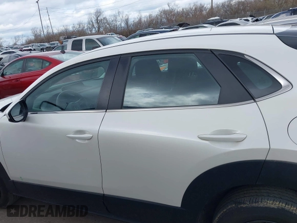 2023 Mazda CX-30 S z VIN 3MVDMBAM6PM572425, wystawiony jako IAAI lot #41833170 z przebiegiem 18 307 mil mil oraz . Historia ofert i sprzedaży dostępna na DreamBid. Obrazek 15.