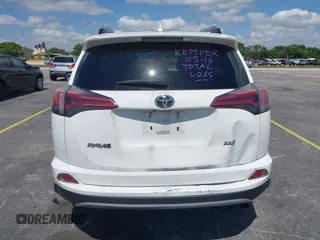 2018 Toyota RAV4 XLE with VIN 2T3WFREV9JW490324, listed as a IAAI auction lot 42298261 with 167,727 mi miles and . Bid and sale history available at DreamBid. Image 16.
