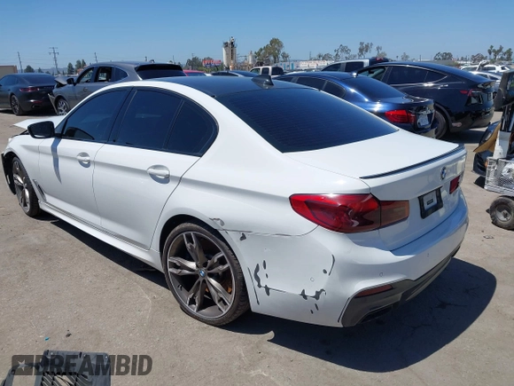 2020 BMW 5 Series M550i xDrive with VIN WBAJS7C0XLCD42738, listed as a IAAI auction lot 42326945 with 50,046 mi miles and . Bid and sale history available at DreamBid. Image 3.