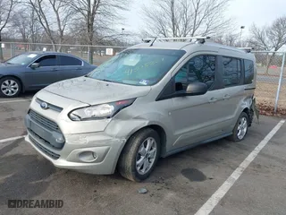 2015 Ford Transit Connect Wagon XLT with VIN NM0AE8F74F1179538, listed as a IAAI auction lot 41505221 with 57,798 mi miles. Bid and sale history available at carsss.com. Image 6.