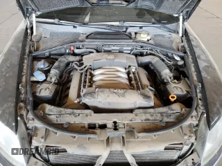 2004 Volkswagen Phaeton V8 z VIN WVWAF63D548010888, wystawiony jako Copart lot #77903574 z przebiegiem 68 511 mil mil oraz Szkody całkowita. Historia ofert i sprzedaży dostępna na DreamBid. Obrazek 11.