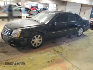 2007 Cadillac DTS V8 z VIN 1G6KD57Y77U212633, wystawiony jako Copart lot #42414815 z przebiegiem 200 922 mil mil oraz Tytuł czysty. Historia ofert i sprzedaży dostępna na DreamBid. Obrazek 1.