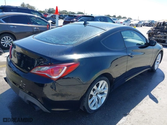 2013 Hyundai Genesis Coupe 2.0T R-Spec with VIN KMHHT6KD1DU096714, listed as a IAAI auction lot 41769934 with 96,532 mi miles. Bid and sale history available at carsss.com. Image 4.