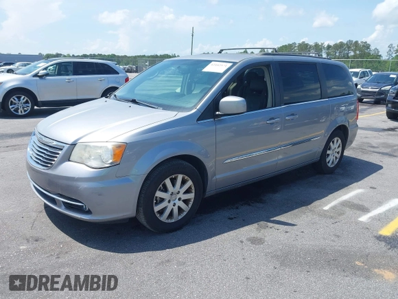 2014 Chrysler Town & Country Touring with VIN 2C4RC1BG7ER271455, listed as a IAAI auction lot 42102571 with 140,578 mi miles. Bid and sale history available at carsss.com. Image 2.