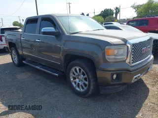 2015 GMC Sierra 1500 Denali z VIN 3GTU2WEJXFG442630, wystawiony jako IAAI lot #42163577 z przebiegiem Nie podano mil oraz . Historia ofert i sprzedaży dostępna na DreamBid. Obrazek 1.