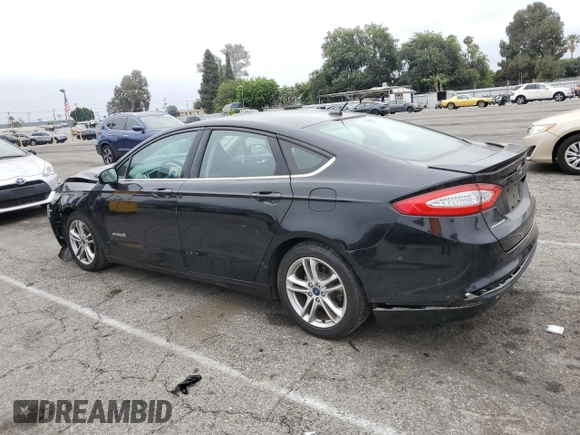 2016 Ford Fusion SE Hybrid with VIN 3FA6P0LU9GR203845, listed as a Copart auction lot 62026805 with 102,456 mi miles and Salvage title. Bid and sale history available at DreamBid. Image 2.