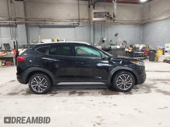 2019 Hyundai Tucson Sport z VIN KM8J33AL6KU938288, wystawiony jako IAAI lot #41849657 z przebiegiem 32 307 mil mil oraz . Historia ofert i sprzedaży dostępna na DreamBid. Obrazek 13.