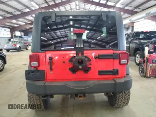 2013 Jeep Wrangler Unlimited Sport z VIN 1C4HJWDG5DL597192, wystawiony jako Copart lot #57300535 z przebiegiem 194 719 mil mil oraz Tytuł czysty. Historia ofert i sprzedaży dostępna na DreamBid. Obrazek 6.