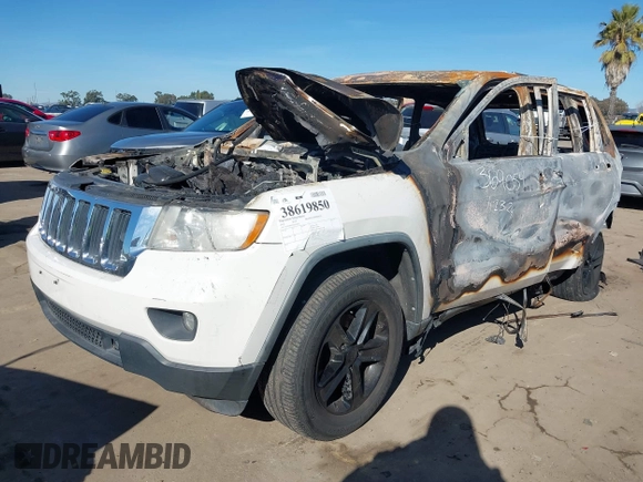 2011 Jeep Grand Cherokee Laredo with VIN 1J4RS4GG2BC618072, listed as a IAAI auction lot 38619850 with Not Provided miles and . Bid and sale history available at DreamBid. Image 16.