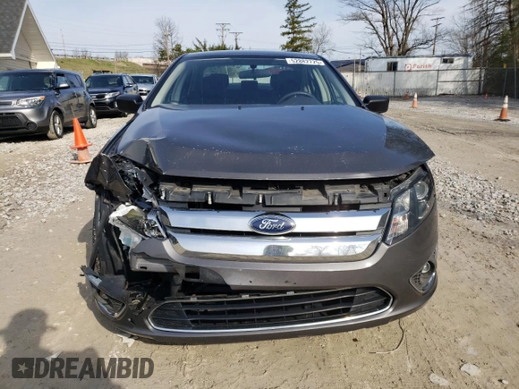 2012 Ford Fusion SE with VIN 3FAHP0HA4CR275893, listed as a Copart auction lot 52882725 with 192,725 mi miles and Salvage Title. Bid and sale history available at DreamBid. Image 5.