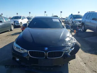 2014 BMW 4 Series 428i with VIN WBA3N7C55EK221259, listed as a IAAI auction lot 41322781 with 100,274 mi miles and . Bid and sale history available at carsss.com. Image 12.