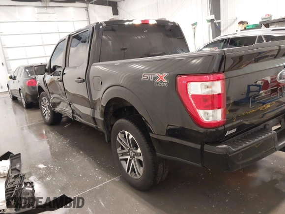 2021 Ford F-150 XL with VIN 1FTFW1E51MFD11166, listed as a IAAI auction lot 41883197 with 33,303 mi miles. Bid and sale history available at carsss.com. Image 3.