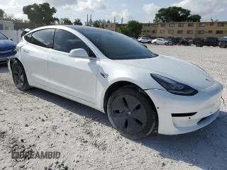 2020 Tesla Model 3 Standard Range Plus z VIN 5YJ3E1EA3LF632566, wystawiony jako Copart lot #56416625 z przebiegiem Nie podano mil oraz Nie do naprawy • Non repairable. Historia ofert i sprzedaży dostępna na DreamBid. Obrazek 4.