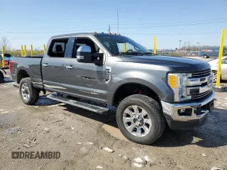 2017 Ford F-350 Platinum with VIN 1FT8W3BT0HEB33866, listed as a Copart auction lot 51691005 with 160,720 mi miles and Salvage Title. Bid and sale history available at DreamBid. Image 4.