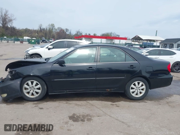 2004 Toyota Camry LE with VIN 4T1BF30K34U080477, listed as a IAAI auction lot 41956998 with 135,441 mi miles. Bid and sale history available at carsss.com. Image 14.