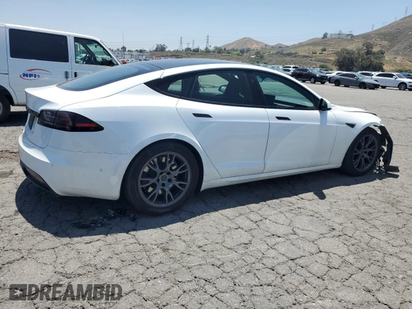 2023 Tesla Model S z VIN 5YJSA1E58PF500032, wystawiony jako Copart lot #57532955 z przebiegiem Nie podano mil oraz Szkoda całkowita • Salvage title. Historia ofert i sprzedaży dostępna na DreamBid. Obrazek 3.