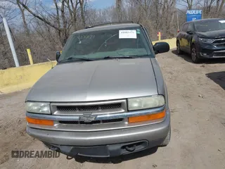 2004 Chevrolet Blazer LS z VIN 1GNDT13X04K164924, wystawiony jako IAAI lot #41803471 z przebiegiem 166 708 mil mil oraz . Historia ofert i sprzedaży dostępna na DreamBid. Obrazek 12.