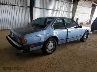 1985 BMW 6 Series 635CSi with VIN WBAEC8400F0611576, listed as a Copart auction lot 52735165 with 152,898 mi miles and Salvage Title. Bid and sale history available at carsss.com. Image 3.