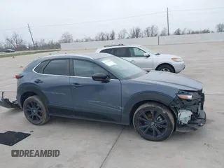2023 Mazda CX-30 S Carbon Edition with VIN 3MVDMBCM0PM532449, listed as a IAAI auction lot 41799255 with 60,604 mi miles and . Bid and sale history available at DreamBid. Image 14.