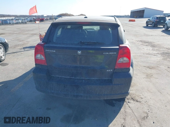 2010 Dodge Caliber SXT with VIN 1B3CB4HA4AD651946, listed as a IAAI auction lot 41771139 with 165,663 mi miles and . Bid and sale history available at DreamBid. Image 17.