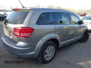 2015 Dodge Journey SE z VIN 3C4PDCAB7FT719679, wystawiony jako IAAI lot #41839838 z przebiegiem 119 610 mil mil oraz . Historia ofert i sprzedaży dostępna na DreamBid. Obrazek 4.