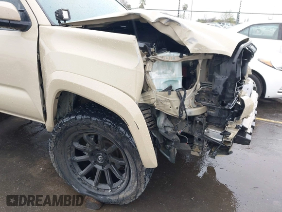 2016 Toyota Tacoma SR5 with VIN 3TMDZ5BN3GM003351, listed as a IAAI auction lot 41721932 with 100,774 mi miles and . Bid and sale history available at DreamBid. Image 19.