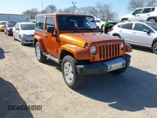 2010 Jeep Wrangler Sahara z VIN 1J4GA5D13AL222537, wystawiony jako IAAI lot #41978214 z przebiegiem 149 194 mil mil oraz . Historia ofert i sprzedaży dostępna na DreamBid. Obrazek 1.