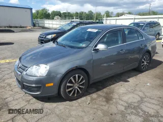 2009 Volkswagen Jetta SE z VIN 3VWRZ71K79M168084, wystawiony jako Copart lot #57854825 z przebiegiem 150 986 mil mil oraz Szkoda całkowita • Salvage title. Historia ofert i sprzedaży dostępna na DreamBid. Obrazek 1.