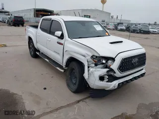 2019 Toyota Tacoma 4WD SR with VIN 3TMCZ5AN4KM220154, listed as a IAAI auction lot 41602065 with 92,345 mi miles. Bid and sale history available at carsss.com. Image 1.