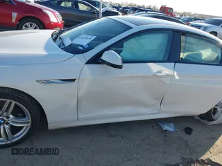 2015 BMW 6 Series 640i xDrive with VIN WBA6B8C50FD453317, listed as a IAAI auction lot 41635430 with 77,811 mi miles and . Bid and sale history available at DreamBid. Image 6.