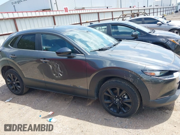 2024 Mazda CX-30 S Select Sport z VIN 3MVDMBBM5RM626265, wystawiony jako IAAI lot #42220770 z przebiegiem 17 895 mil mil oraz . Historia ofert i sprzedaży dostępna na DreamBid. Obrazek 14.