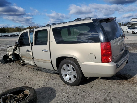 2011 GMC Yukon XL SLT with VIN 1GKS1KE07BR385988, listed as a Copart auction lot 80263514 with 270,820 mi miles and Salvage Title. Bid and sale history available at carsss.com. Image 2.