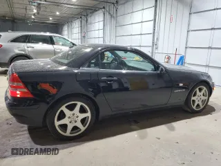2000 Mercedes-Benz SLK-Class Kompressor with VIN WDBKK47F4YF165805, listed as a Copart auction lot 86942634 with 86,624 mi miles and Salvage Title. Bid and sale history available at carsss.com. Image 3.