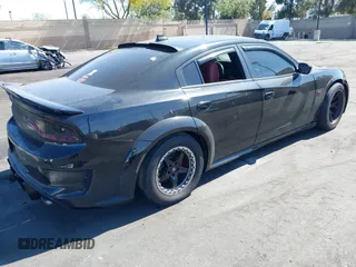 2019 Dodge Charger SRT Hellcat z VIN 2C3CDXL91KH749445, wystawiony jako IAAI lot #42300340 z przebiegiem 68 224 mil mil oraz . Historia ofert i sprzedaży dostępna na DreamBid. Obrazek 4.
