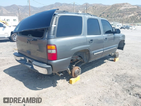 2001 Chevrolet Tahoe LS z VIN 1GNEC13T51J153677, wystawiony jako IAAI lot #42459552 z przebiegiem 201 209 mil mil oraz . Historia ofert i sprzedaży dostępna na DreamBid. Obrazek 4.