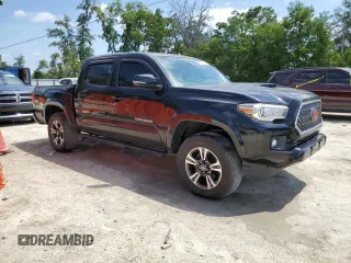 2018 Toyota Tacoma SR5 with VIN 3TMAZ5CN0JM058283, listed as a Copart auction lot 53863265 with 135,562 mi miles and Salvage Title. Bid and sale history available at DreamBid. Image 4.