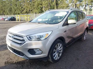 2017 Ford Escape Titanium with VIN 1FMCU0JD0HUB79739, listed as a IAAI auction lot 41807975 with 121,902 mi miles. Bid and sale history available at carsss.com. Image 2.