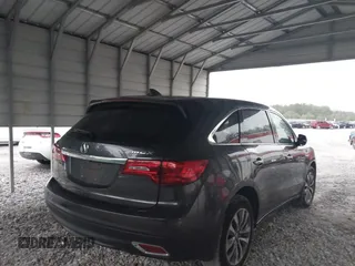 2014 Acura MDX Tech Pkg with VIN 5FRYD3H42EB009323, listed as a IAAI auction lot 40863681 with 87,746 mi miles. Bid and sale history available at carsss.com. Image 4.