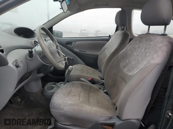 2000 Toyota ECHO with VIN JTDAT1231Y0041399, listed as a Copart auction lot 83774514 with 128,465 mi miles and Salvage Title. Bid and sale history available at DreamBid. Image 7.