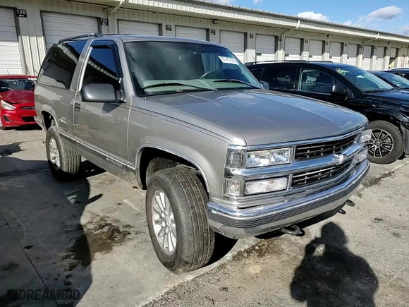 1999 Chevrolet Tahoe with VIN 3GNEK18R9XG152347, listed as a Copart auction lot 80785154 with 301,018 mi miles and Salvage Title. Bid and sale history available at carsss.com. Image 12.
