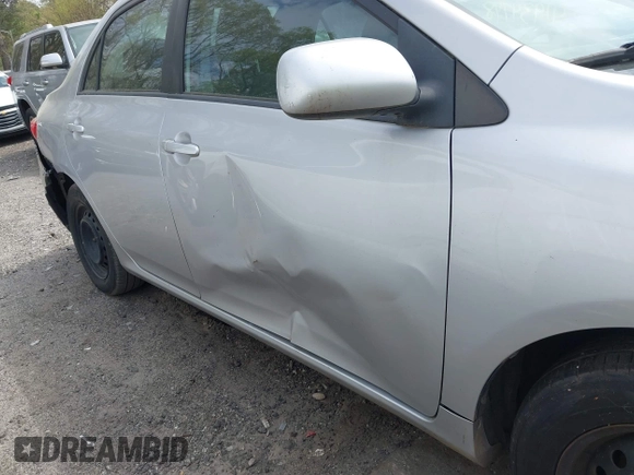 2011 Toyota Corolla L with VIN 2T1BU4EE8BC687021, listed as a IAAI auction lot 41934778 with 176,587 mi miles. Bid and sale history available at carsss.com. Image 13.