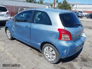 2008 Toyota Yaris with VIN JTDJT923085205341, listed as a IAAI auction lot 41762601 with 218,299 mi miles. Bid and sale history available at carsss.com. Image 3.
