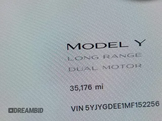 2021 Tesla Model Y Long Range with VIN 5YJYGDEE1MF152256, listed as a IAAI auction lot 42004769 with 35,176 mi miles. Bid and sale history available at carsss.com. Image 16.