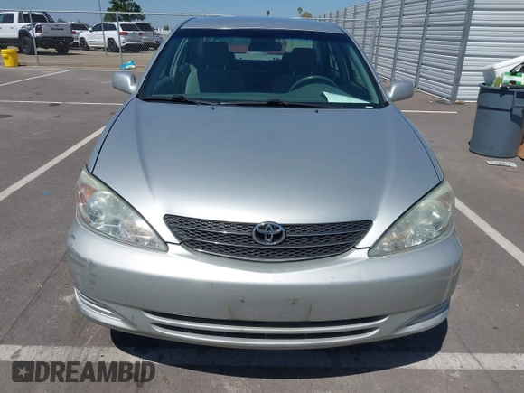 2004 Toyota Camry LE with VIN 4T1BE32K74U300025, listed as a IAAI auction lot 42035954 with 115,203 mi miles. Bid and sale history available at carsss.com. Image 12.