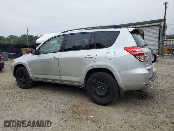 2012 Toyota RAV4 Sport with VIN JTMRF4DV5CD044821, listed as a Copart auction lot 61555935 with 94,301 mi miles and Salvage title. Bid and sale history available at DreamBid. Image 2.